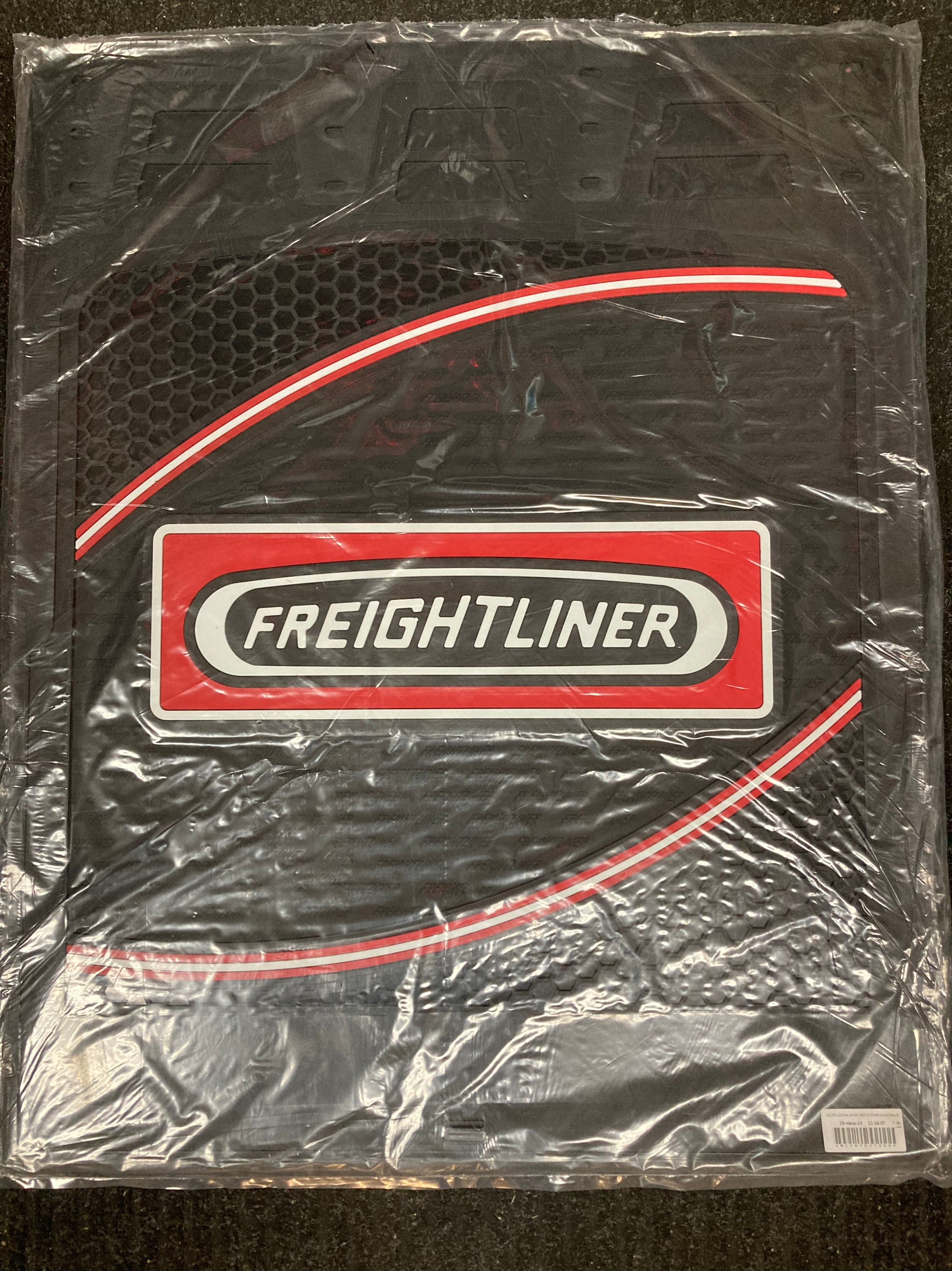 Black 24x30 Freightliner mud flap with curve design for heavy-duty trucks
