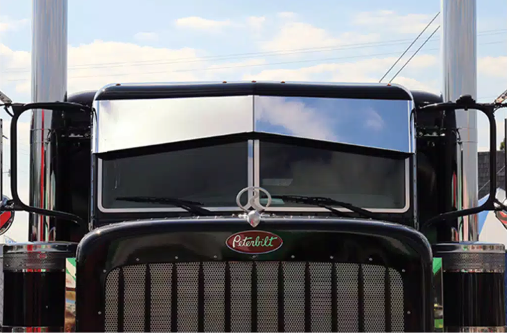 Peterbilt Ultra/Flat Post Mount Darwin Un-Tie Drop Visor in polished stainless steel installed on flat-top cab, heavy-duty truck exterior accessory.